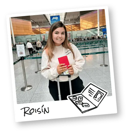 Author Roisin at the airport holding her passport